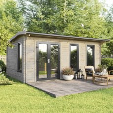 The 20 x 14 Powersheds Apex Log Cabin in 44mm log with uPVC stands in a garden with the double doors positioned on the left-hand side.