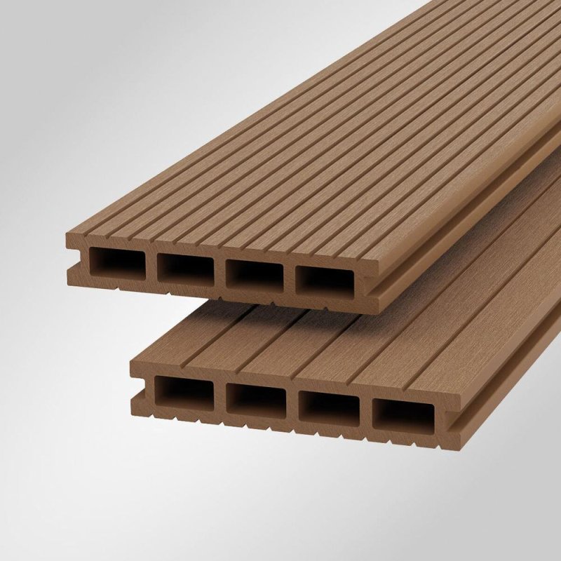 Two stacked Shire Light-Neo composite decking boards in Gold showing rectangular hollow channels and grooved surface.