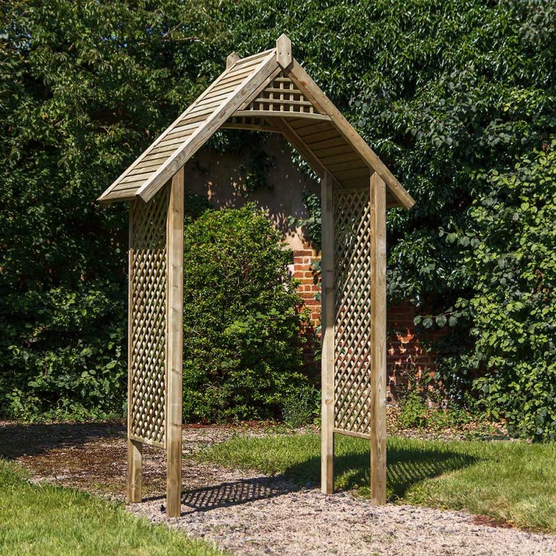 Grange Valencia Garden Arch - displayed on gravel