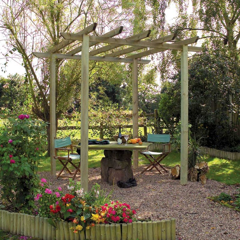 Grange Traditional Wooden Pergola 2.7m Posts - displayed in a spring garden