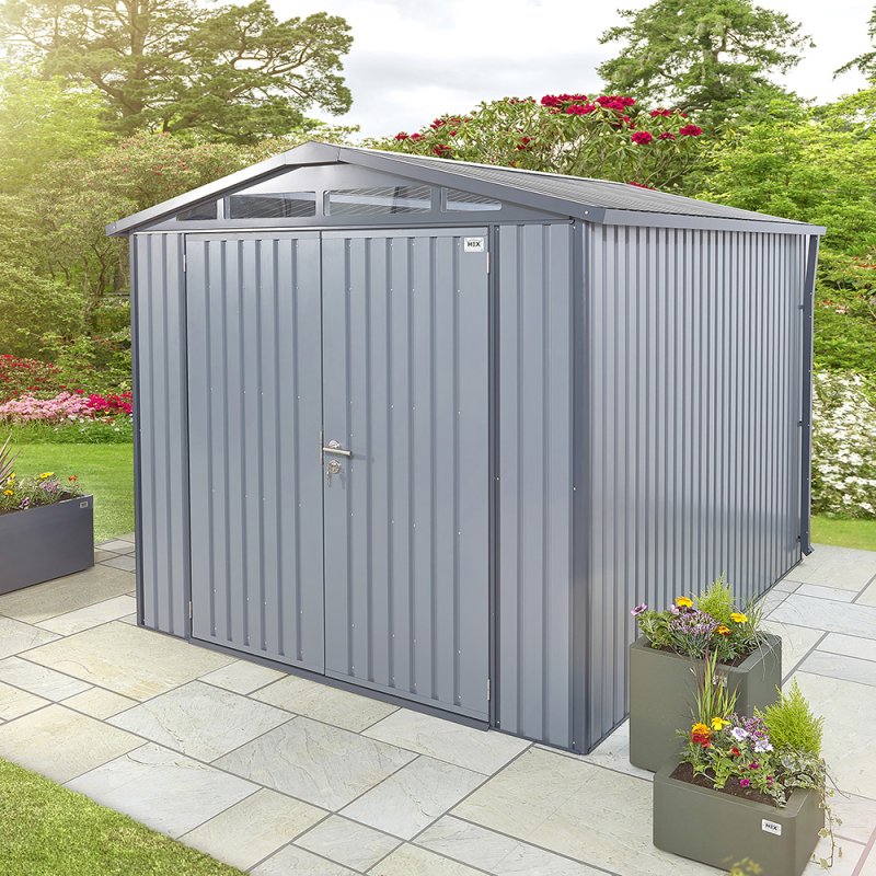 10x6 Hex Living Alton Apex Metal Shed in Anthracite Grey - in situ, angle view, doors closed