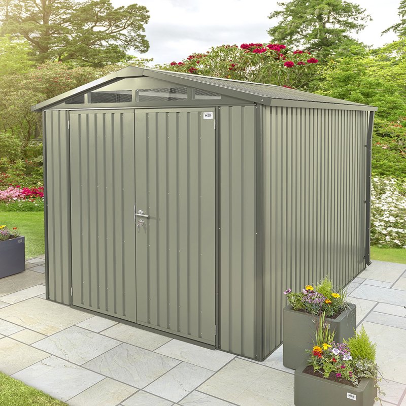 10x8 Hex Living Alton Apex Metal Shed in Sage Green - in situ, angle view