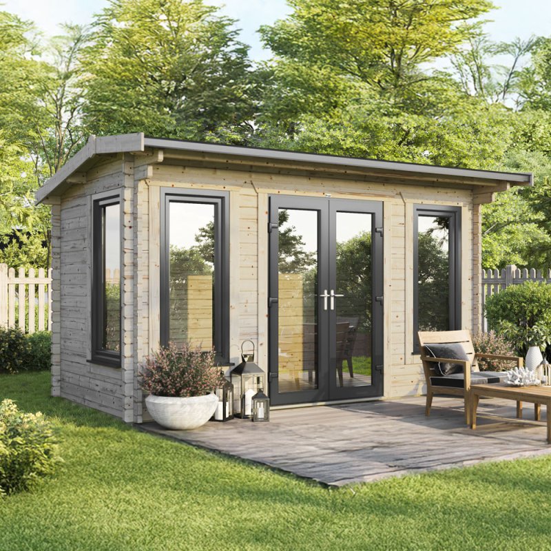 The 16 x 8 Powersheds Apex Log Cabin in 44mm log with uPVC situated in a garden with the doors located in the centre of the front aspect.