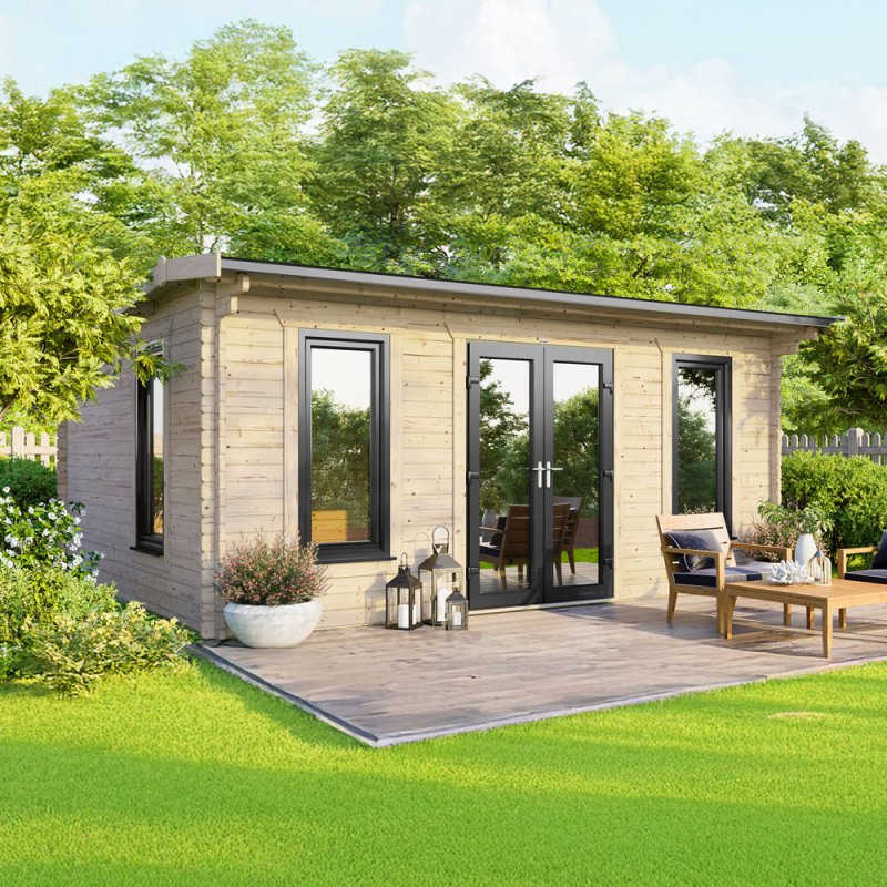 The 18 x 12 Powersheds Apex Log Cabin in 44mm log with uPVC situated in a garden with the doors located in the centre of the front.